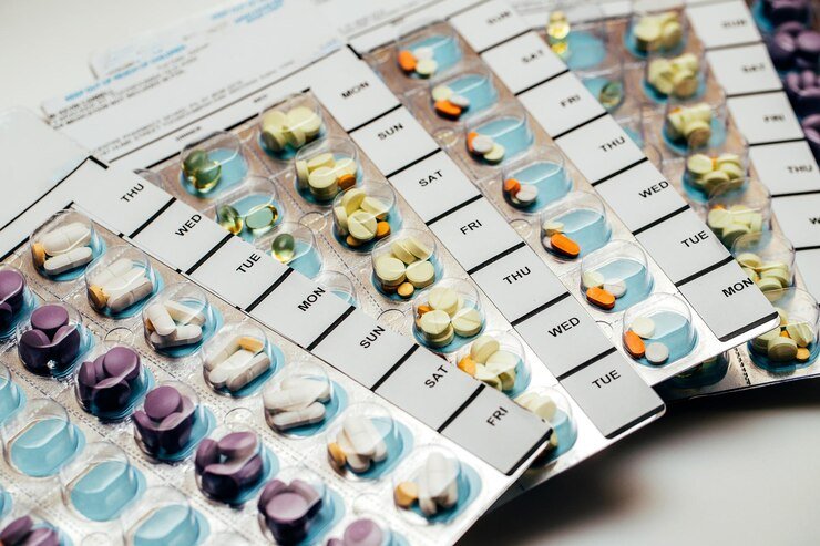 High angle view of a computer keyboard used for managing pharmacy services online